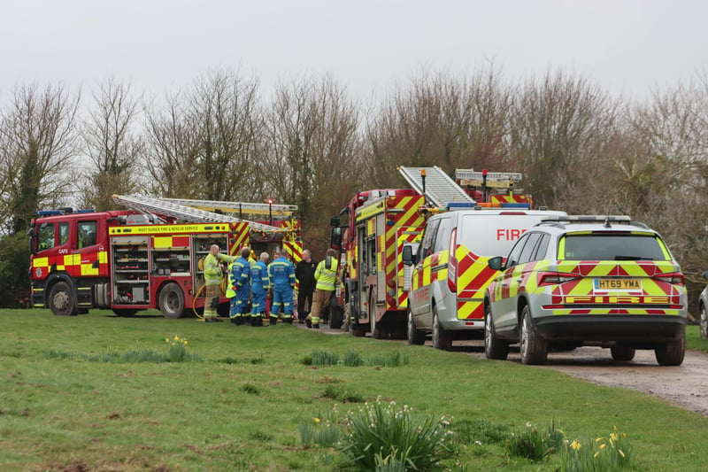 The emergency services came out in force to rescue a family who became stuck in the mud in West Wittering over the weekend.