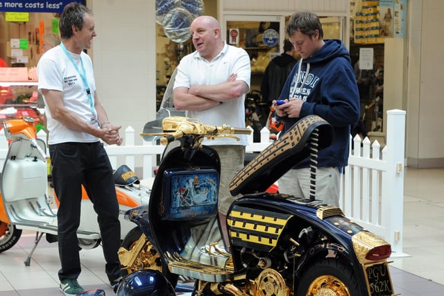 Chatting over the scooter display in the Guildbourne Centre