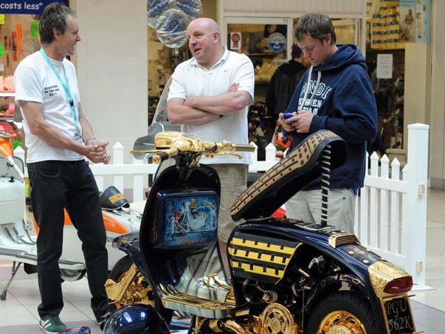 Chatting over the scooter display in the Guildbourne Centre