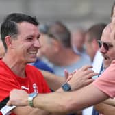 In happier times: Paul Barnes meets the Hastings fans at Dulwich | Picture: Scott White