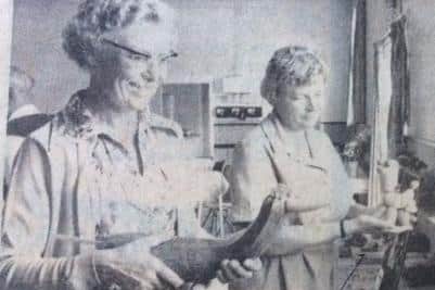 Mrs Kay Duggan, left, and Miss Jean Scott judging the children's funny vegetables at the annual show in 1980