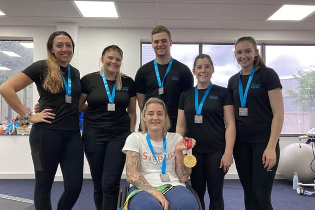 Kylie Grimes MBE with Neurokinex trainers at Gatwick who completed the Step Up Challenge 2022