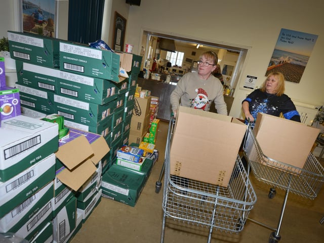 Surviving Christmas 2023 in Hastings on December 14: Packing and delivering hampers, and also sorting through the toys.