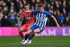 Evan Ferguson of Brighton is challenged by Jack Harrison of Everton during the Premier League match at the Amex Stadium last Saturday