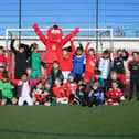 Soccer School players with Reggie the Red (Photo: Crawley Town Community Foundation)