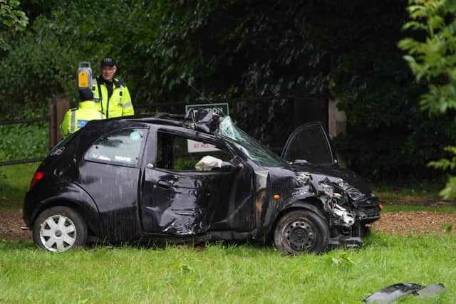 Pictures from the one-vehicle crash on the A24 northbound. Pictures by Eddie Mitchell