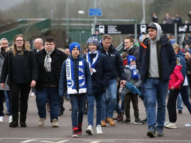 BRIGHTON, ENGLAND - FEBRUARY 18: Brighton & Hove Albion fans arrive at the stadium prior to the Premier League match between Brighton & Hove Albion and Fulham FC at American Express Community Stadium on February 18, 2023 in Brighton, England. (Photo by Steve Bardens/Getty Images)