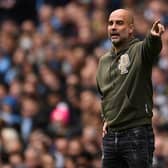 Manchester City's Spanish manager Pep Guardiola has signed a new deal with the Premier League champions