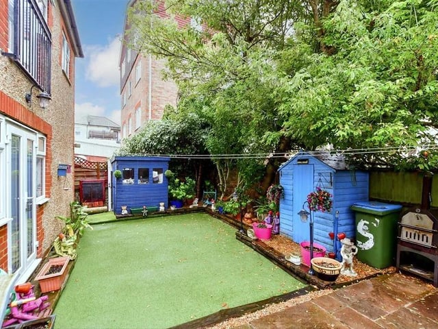 The rear garden soaks up the sun beautifully.
