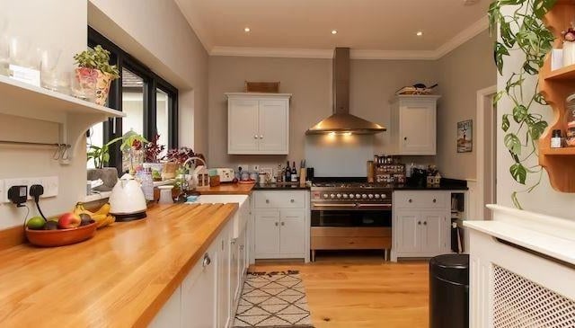 The beautifully fitted kitchen has an extensive range of base and wall units with complementary working surfaces, integrated appliances and appliance space. There is a separate utility room.