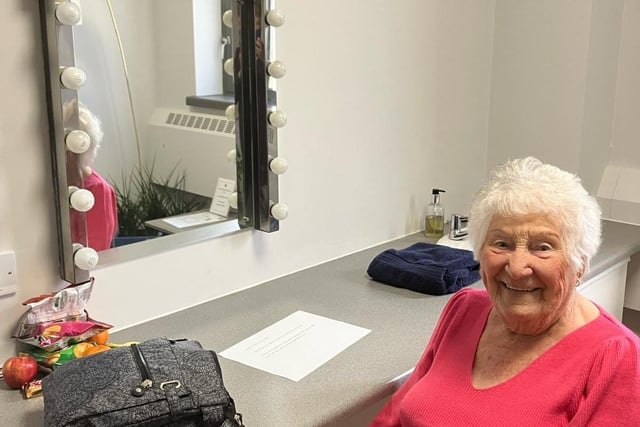 Crawley resident Joan Izzard celebrates her 100th birthday on Wednesday, February 7. Here she is pictured in her dressing room at Blankety Blank