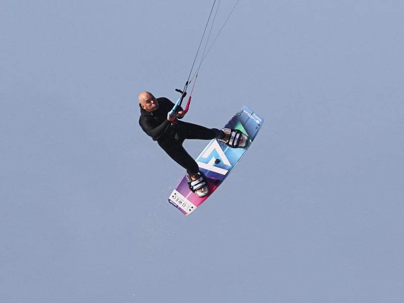 Kitesurfer Lewis Crathern high in the sky. Picture: Eunice Bergin