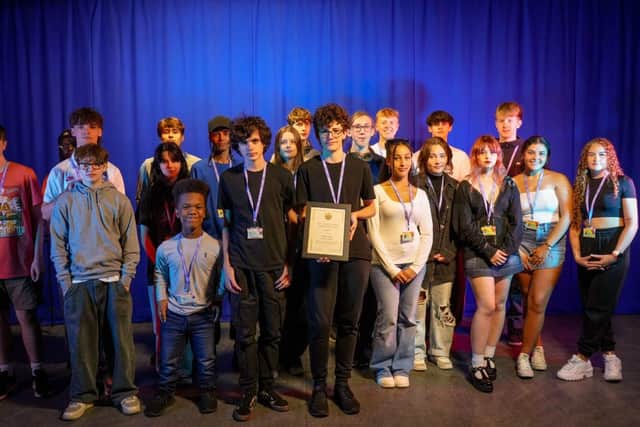 Bexhill College media students group photo with the award