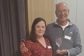 Mike Shaw with Worthing Samaritans director Fiona Cameron and the engraved goblet to mark his 50th year as a listening volunteer