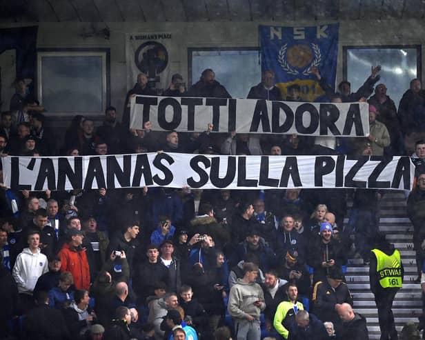 Brighton fans hold a banner ahead of the UEFA Europa League round of 16 second leg against Roma