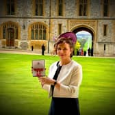 West Sussex charity founder Jane Green with her MBE at Windsor Castle