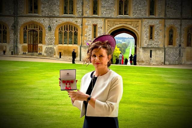 West Sussex charity founder Jane Green with her MBE at Windsor Castle