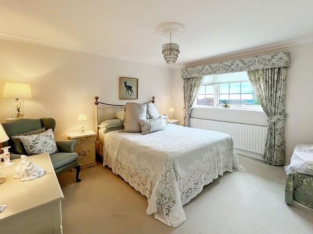 This three-bedroom, detached house with a stunning south-facing garden has come on the market with Graham Butt priced at £695,000