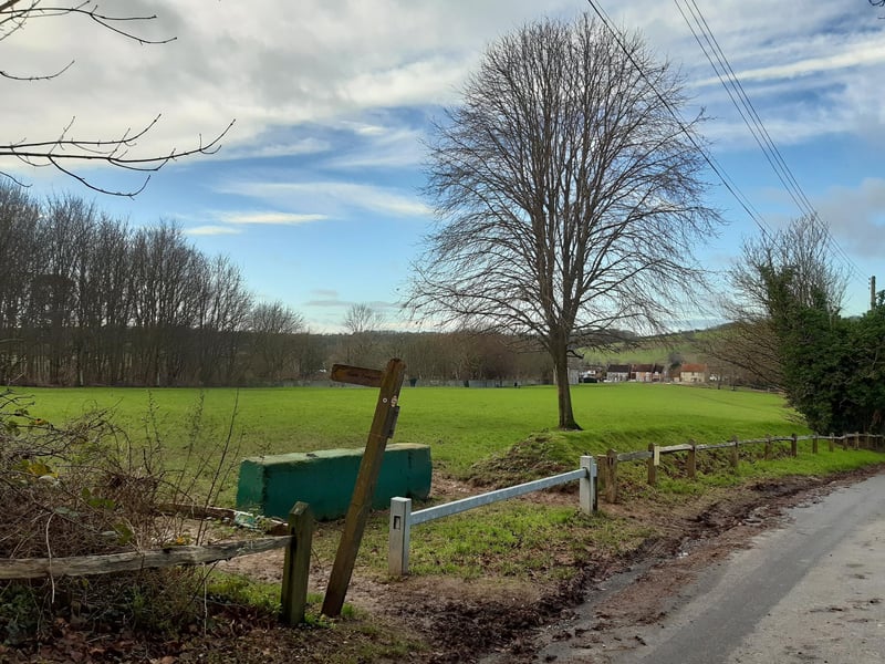 Before long, you arrive at Nepcote Green and you should follow the footpath sign to head on to the grass.