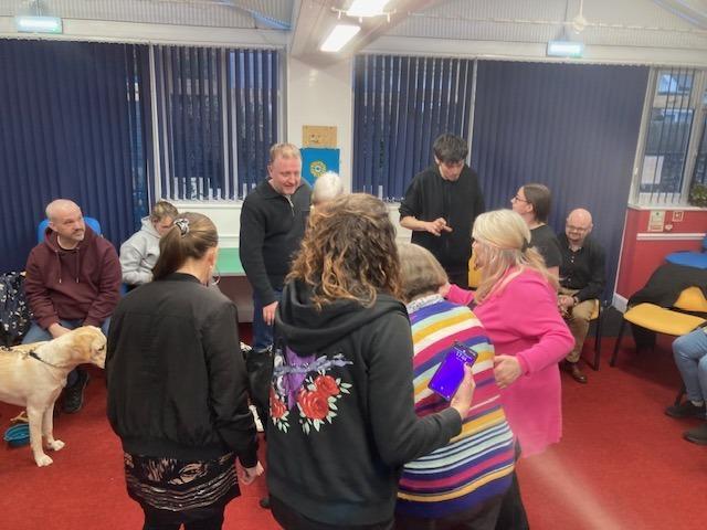 Comedians Chris McCausland and Jon Long with Sight Support Worthing volunteers and members at the charity's centre in Rowlands Road