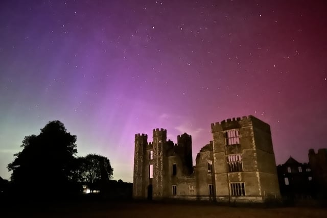 The lights almost bring Cowdray Castle back to life.