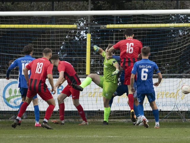 United's No16 Alex Webber heads home Worthings equaliser against Selsey in the teams' 1-1 draw at the Seal Bay Resort Stadium