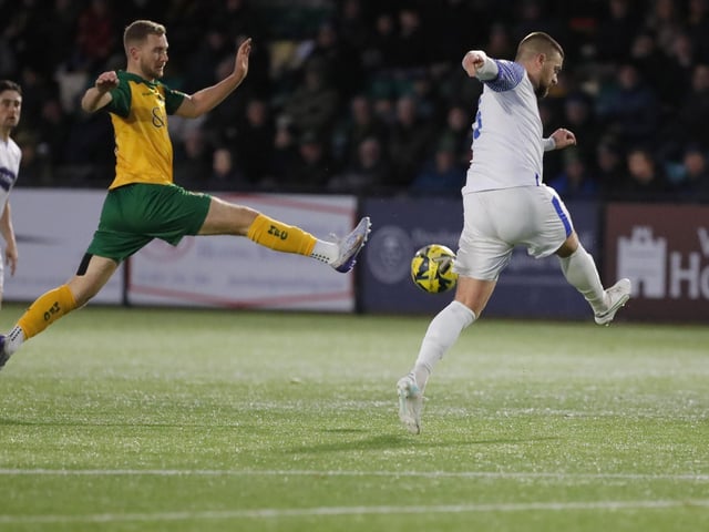 FA Trophy action between Horsham and AFC Totton