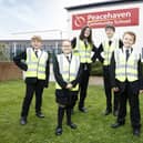 Children at Peacehaven Community School wearing their new hi-vis jackets. 