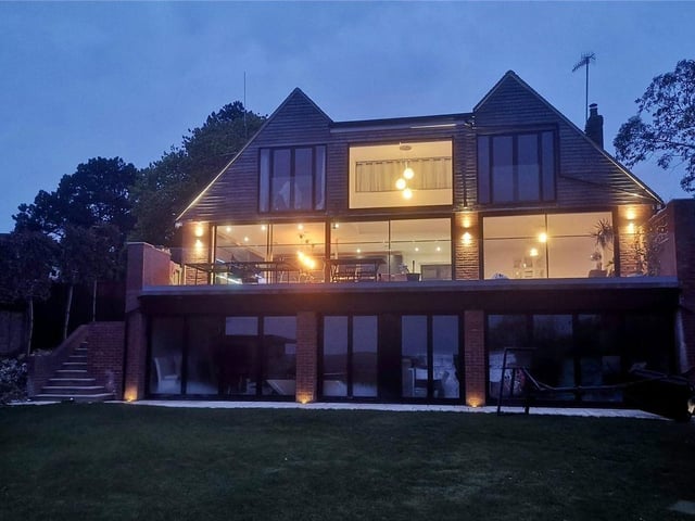 Zoopla said, "The rear garden is landscaped to provide a level area of level lawn which measures approximately 50' in depth with flower beds and borders."