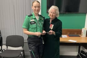 Lord Lieutenant's Cadet for West Sussex Erin Morra receiving her award from Lady Barttelot.
