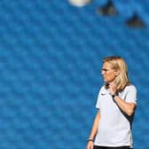 Sarina Wiegman takes in her surroundings at the Amex Stadium ahead of their clash against Norway tonight