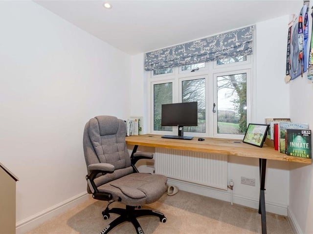 There are three bedrooms and an office on the first floor
