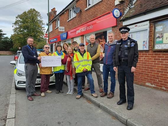 Summersdale Speed Action Group have been awarded a big cheque by Sussex Police allowing them to fund their own speed watching equipment.