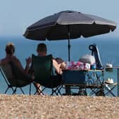 People enjoying the sun on Goring seafront. Photo: Eddie Mitchell