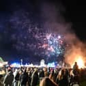 Crowds watching the fireworks above the bonfire and Cole's Funfair at last year's event. Picture: Trevor Whittle/LBS