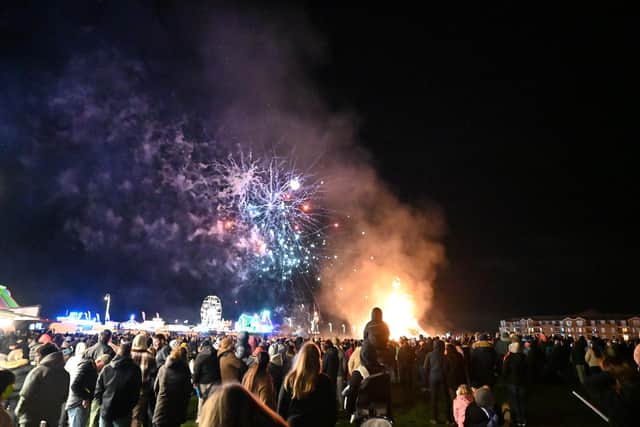 Crowds watching the fireworks above the bonfire and Cole's Funfair at last year's event. Picture: Trevor Whittle/LBS