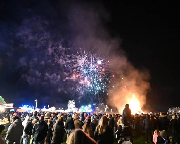Crowds watching the fireworks above the bonfire and Cole's Funfair at last year's event. Picture: Trevor Whittle/LBS
