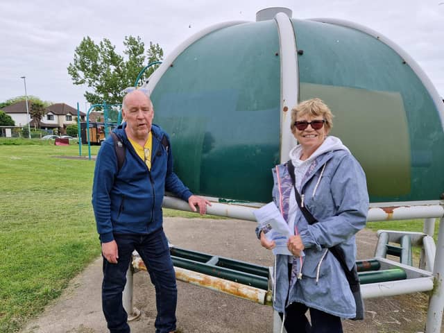 Colin McHale and Mary Mernagh from Love Pond Lane Park Durrington Project beside the shelter that has seen recent attention