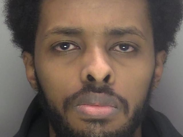Two men have been sentenced for their roles in supplying class A drugs in Crawley. Police completed a warrant at an address where a large amount of cash and drugs were found. A golf ball size package containing wraps of drugs was thrown from a window during the warrant. Officers found more wraps inside and nearly £6,000 in cash. It was part of a countywide week of action to disrupt drugs supply and to safeguard vulnerable individuals during County Lines Intensification Week. In West Sussex officers worked alongside partner agencies and forces to complete ten warrants, seize £12,000 in cash, 17 phones, 12 knives, and one vehicle. A total of 37 arrests were made, while 26 children and 20 vulnerable adults were safeguarded. Ali Abdiqadir (pictured), 25, of Braemar Avenue, Brent, London, and Bashir Mohammed, 27, of Canterbury Terrace, Brent, London, were arrested and charged. They admitted possession of crack cocaine with intent to supply, acquiring, using or possessing criminal property (money laundering), and possession of cannabis at a hearing on March 12. They were remanded in custody for sentencing at Lewes Crown Court on April 27. Abdiqadir was sentenced for two years in prison for his role, while Mohammed was sentenced to a two-year suspended prison sentence. He was ordered to complete 100 hours of unpaid work, 10 rehabilitation activity requirement sessions, and pay a £187 surcharge. A sum of £5,945 was seized under the Proceeds of Crime Act.
