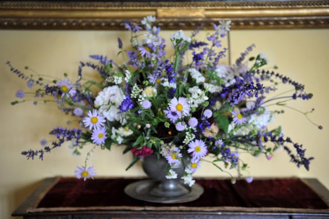 A team of flower arrangers create the displays. SR23090501 Photo S Robards/National World
