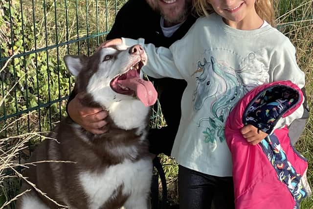 Annalise enjoyed a walk with her dad Wayne and 8 Below foster dog Echo