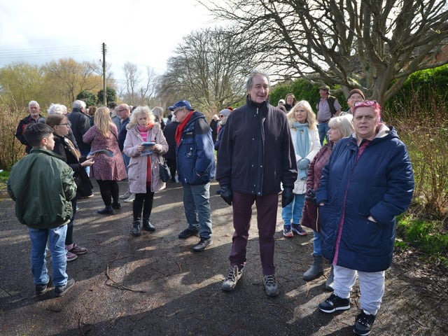 Public gathering by the gates of the Northeye site in Bexhill on Saturday April 1.