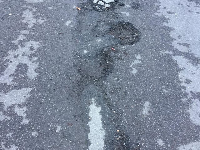Potholes in Broomfield Drive, Billingshurst