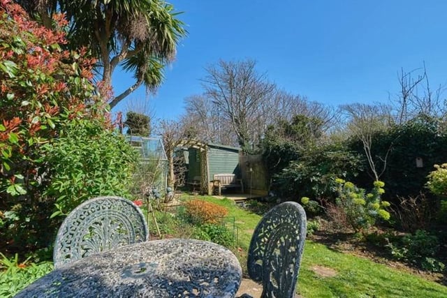 Outside the front is mainly laid to lawn with a remainder path leading to the front door. The attractive rear garden is approximately 80ft in length being lovingly landscaped and laid out with a variety of seating areas to really make use of the space and seclusion.