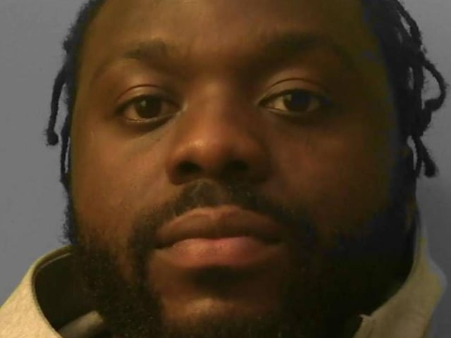 Two men have been sentenced in connection with their roles in drug dealing in Brighton. Ivan Bokolo (pictured) and Ebrima Macauley used an address in Cannon Place where a large quantity of class A drugs were found. Both men returned to a room at the address, where police had set outside to guard the scene. Bokolo attempted to dismantle his mobile phone in front of officers, and swallowed a SIM card from a mobile phone during the course of his arrest. Separately, he was also observed at a later date operating from a rented accommodation property in Richmond Place. They were charged and appeared before Lewes Crown Court, where they were jailed for their offences. The court heard how officers attended the property in Cannon Place at about 8am on August 23, 2020, in relation to a separate matter. Inside a room they found more than 200 wraps of heroin and crack cocaine worth an estimated street value of more than £2,000. Bokolo, 29, unemployed of Pultney Street, London, arrived back at the flat at 12.30pm and was arrested suspicion of possessing class A drugs with intent to supply. Then on November 17, 2021, Bokolo was observed entering and exiting a premises in Richmond Place. A phone linked to a drug dealing telephone line dubbed “Rico” was found on his person. The phone had been used to send bulk advertising messages for drug deals. Inside the address, police found a Louis Vuitton draw string bag containing 100 wraps of class A drugs and £5,000 in cash secreted into the cooker extractor fan. Expensive designer clothing was also found inside the property, which was at odds with Bokolo’s unemployed status. Bokolo was sentenced to nine-and-a-half years in prison after admitting two counts of possessing class A drugs with intent to supply, and one count of being concerned in the supply of class A drugs.