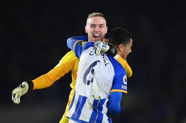 Brighton goalkeeper Jason Steele and defender Levi Colwill celebrate victory against Crystal Palace