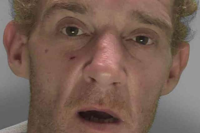Michael Hooper, 43, of Leopold Road, Crawley, has received a significant custodial sentence after he was caught on camera committing two robberies in a West Sussex town, Sussex Police has confirmed. Picture courtesy of Sussex Police