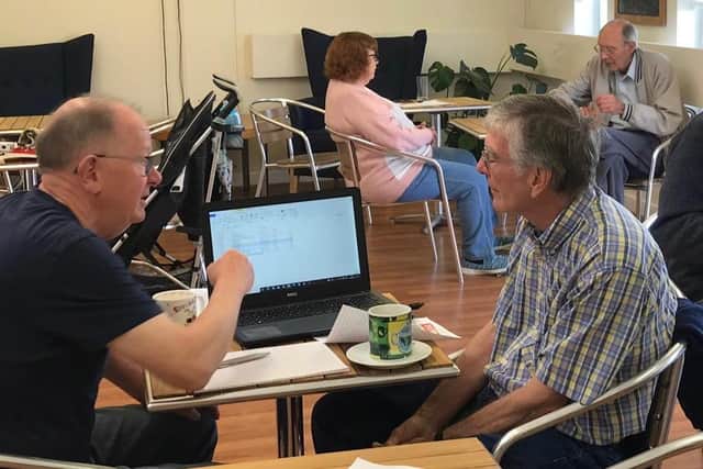 The IT group for older people at The Spire Café, Burgess Hill, is seeking new volunteers