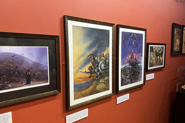 The exhibit features Tolkien-inspired paintings by a variety of artists.