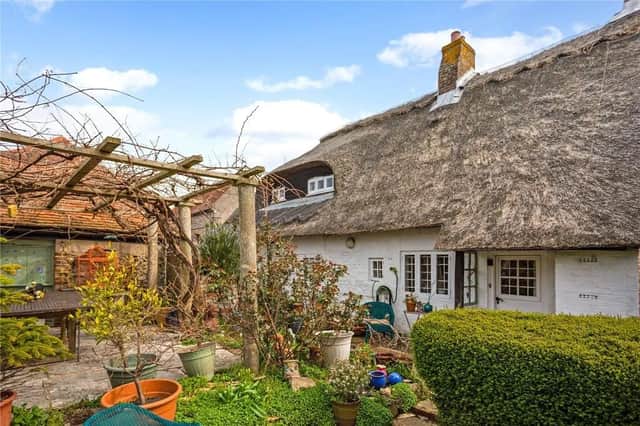 Could this charming listed cottage be yours?